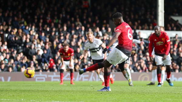 Paul Pogba slots home from the penalty spot