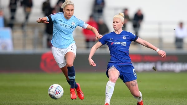 Steph Houghton of Manchester City hounds Bethany England