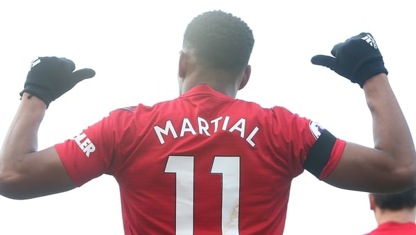 Anthony Martial celebrates his fine solo goal at Fulham