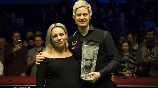 Neil Robertson celebrates the win with his wife