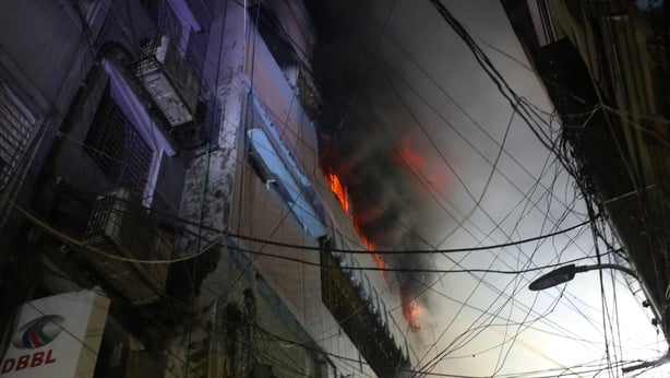 Fire kills dozens in centuries-old Bangladesh district Fire kills dozens in centuries-old Bangladesh district