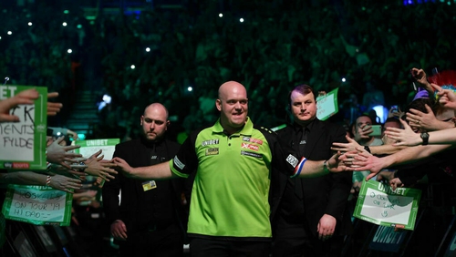 Michael van Gerwen makes his way to the stage at the 3Arena