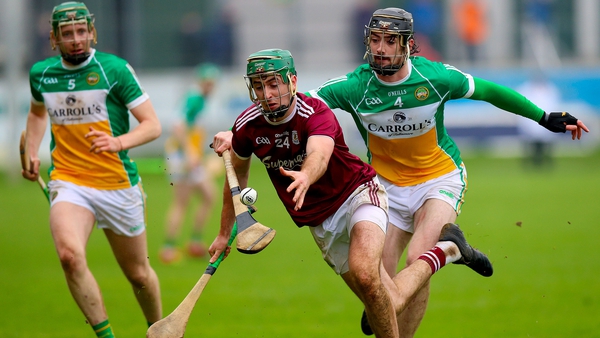 Offaly's Ben Conneely with Brian Concannon of Galway