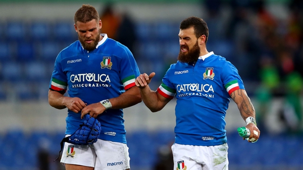 Italy's Dean Budd and Jayden Hayward react following the Six Nations defeat to Ireland