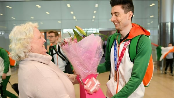 Mark English is greeted at the airport