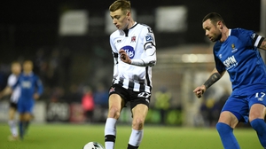 Dundalk's Daniel Kelly and Damien Delaney of Waterford