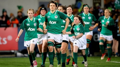 Ireland captain Ciara Griffin leads out he team against Frnace