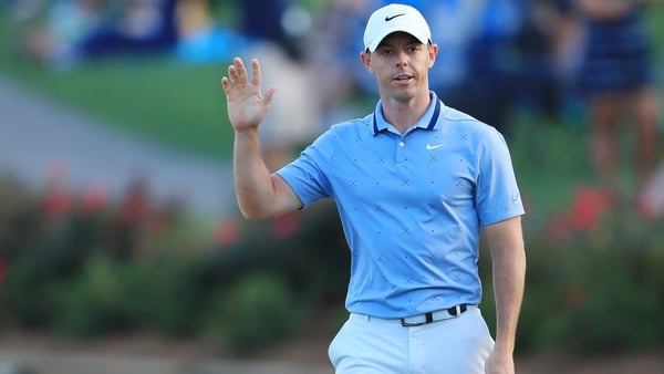 Rory McIlroy salutes the crowd after a birdie on the 17th green