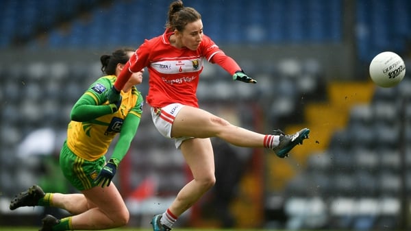 Melissa Duggan of Cork is tackled by Treasa Doherty of Donegal