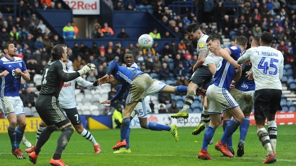 Sean Maguire heads home the only goal of the game at Deepdale