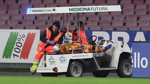 David Ospina being taken off the pitch