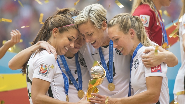 USA players celebrate after winning the 2015 world cup