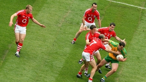 Canty (6) and O'Connor (17) help tackle Donegal's Michael Murphy