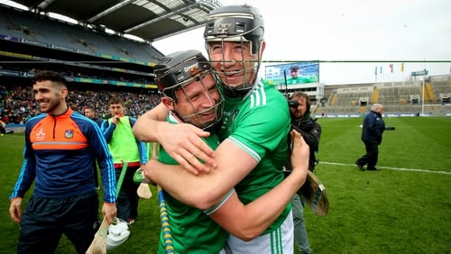 Peter Casey celebrates with Diarmaid Byrnes