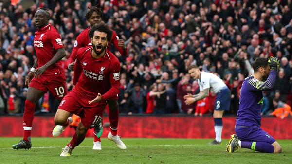 Mohamed Salah wheels away in celebration after Liverpool's dramatic winner
