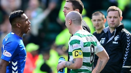 Alfredo Morelos (L) is given his marching orders by referee Bobby Madden