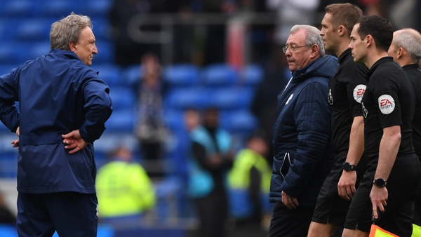 Cardiff manager Neil Warnock (L) was not happy with Craig Pawson and the officials