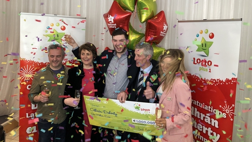 Odhrán Doherty accepting his winnings at National Lottery headquarters in Dublin