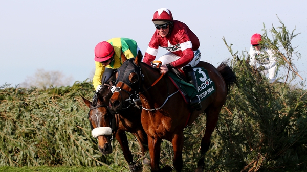 Davy Russell leads Tiger Roll over the final jump