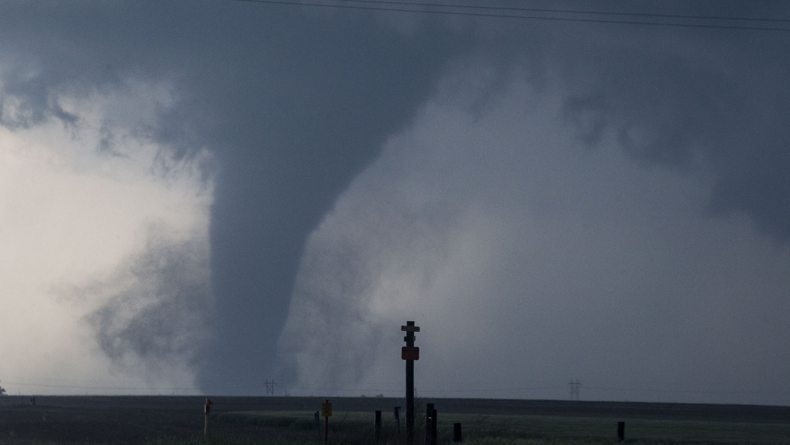 Five killed as massive storm and tornadoes sweep US