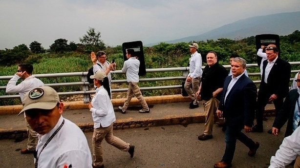 US Secretary of State Mike Pompeo (R, black shirt) and Colombian President Ivan Duque visit the Simon Bolivar International Bridge in Cucuta,, Colombia, on the border with Venezuela