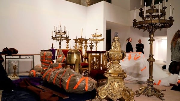 Some of the artworks and relics rescued from Notre-Dame Cathedral at the Hotel de Ville in Paris