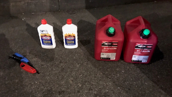 Petrol cans, lighter fluid and butane lighters were found by police (Pic: @NYPDnews)