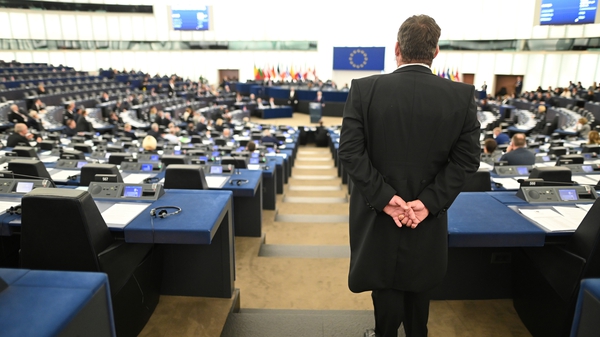 An usher watches the debate on the future of the EU at the European Parliament in Strasbourg