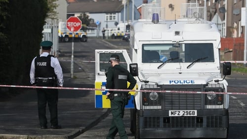 Police at the scene in Derry where Lyra McKee was shot