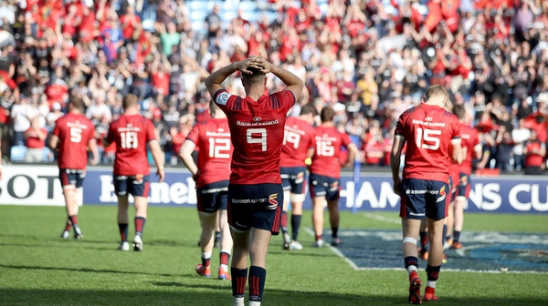 Munster players dejected at the final whistle