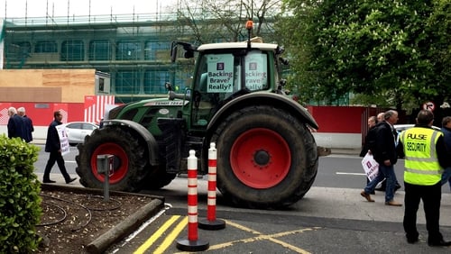 A tractor blocked the entrance for a short time to the hotel where AIB's AGM is taking place today