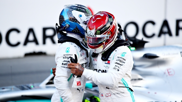 Valtteri Bottas and Lewis Hamilton embrace