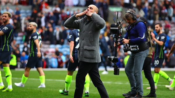 Pep Guardiola salutes the City fans after the win over Burnley