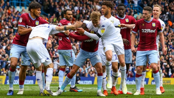 Players clash after Leeds' controversial goal against Aston Villa