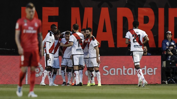 Rayo Vallecano players celebrate the only goal of the game