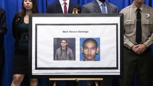 Portrait of alleged terrorist Mark Steven Domingo is displayed during a press conference uncovering details of his arrest