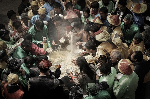 Noodles in a large cauldron