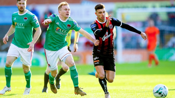 Daniel Mandroiu tries to get away from Conor McCormack at Dalymount