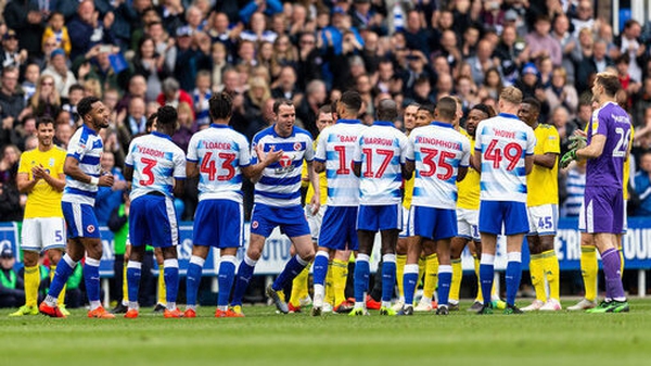 Players line up for a guard of honour for Reading's John O'Shea