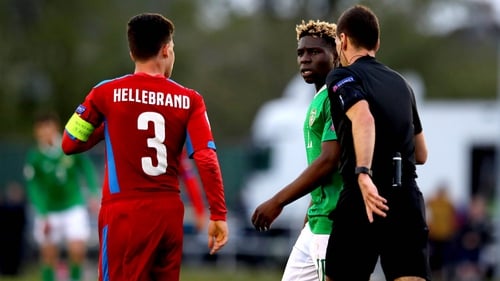 Festy Ebosele (C) was shown a second yellow card for making minimal contact with Czech captain Jan Hellebrand