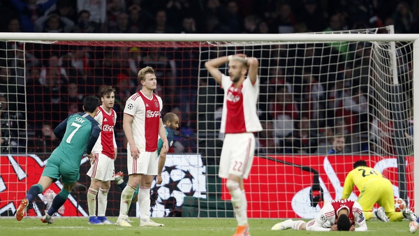 Ajax players dejected after the late goal