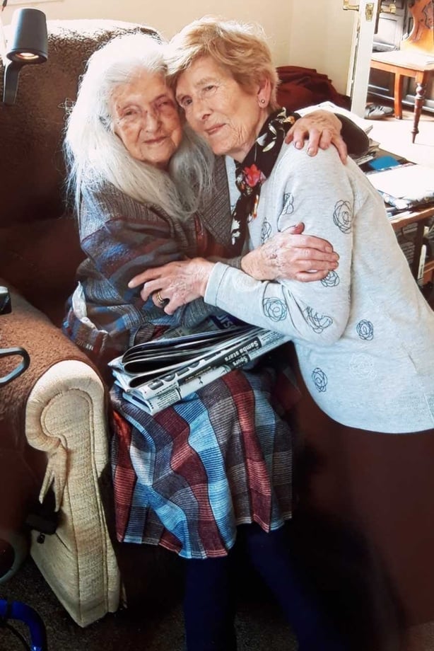 Please find a photo of Elizabeth and Eileen meeting for the first time attached.