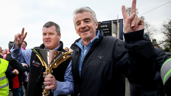 Gordon Elliott (L) and Michael O'Leary pictured with the Aintree Grand National trophy