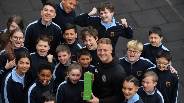 James Talbot collecting his award alongside 5th and 6th class pupils at St Gabriel's School in Stoneybatter, Dublin