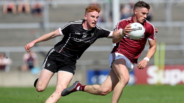 Galway's Shane Walsh and Sean Carribine of Sligo in action during last year's championship meeting between the sides