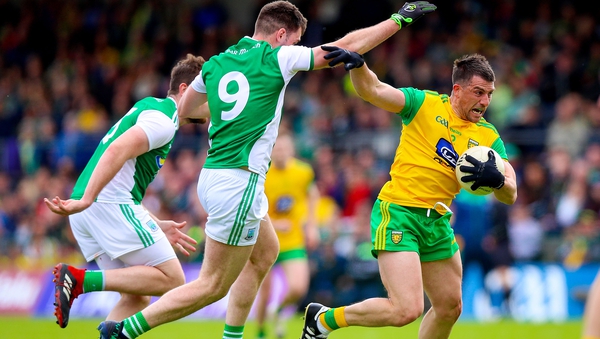 Paddy McGrath breaks clear of Fermanagh's Ryan Jones