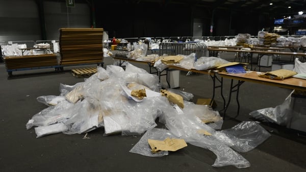 The clean-up operation begins in the RDS count centre in Dublin today