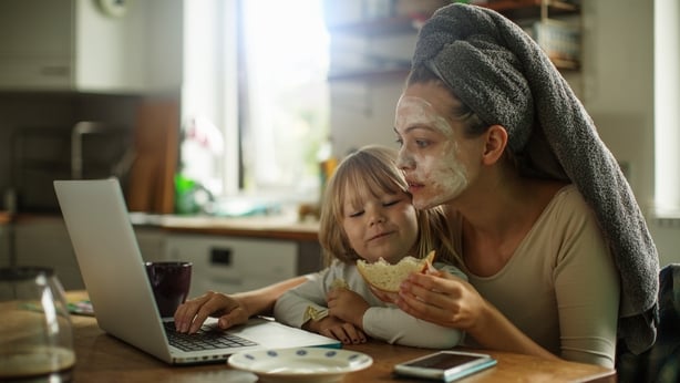 Photo of a mother and daughter having breakfast together in the kitchen