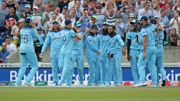 England celebrate after Ben Stokes catches out Andile Phehlukwayo from Adil Rashid bowling