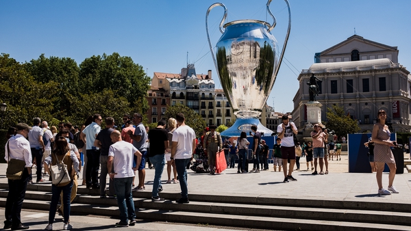 A huge UEFA Champions League Cup seen in front of Palacio Real de Madrid